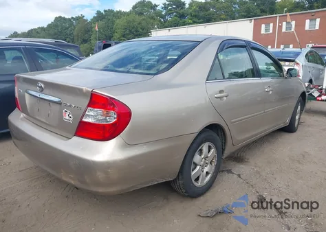 2002 Toyota Camry Le from USA, damaged, VIN 4T1BE32K22U624562